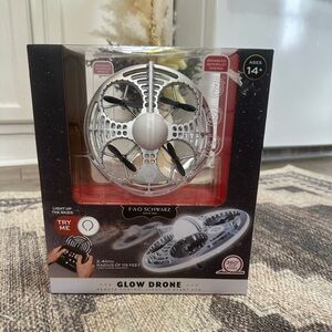 New FAO Schwarz Drone Silver Glow Drone LED Stunt UFO